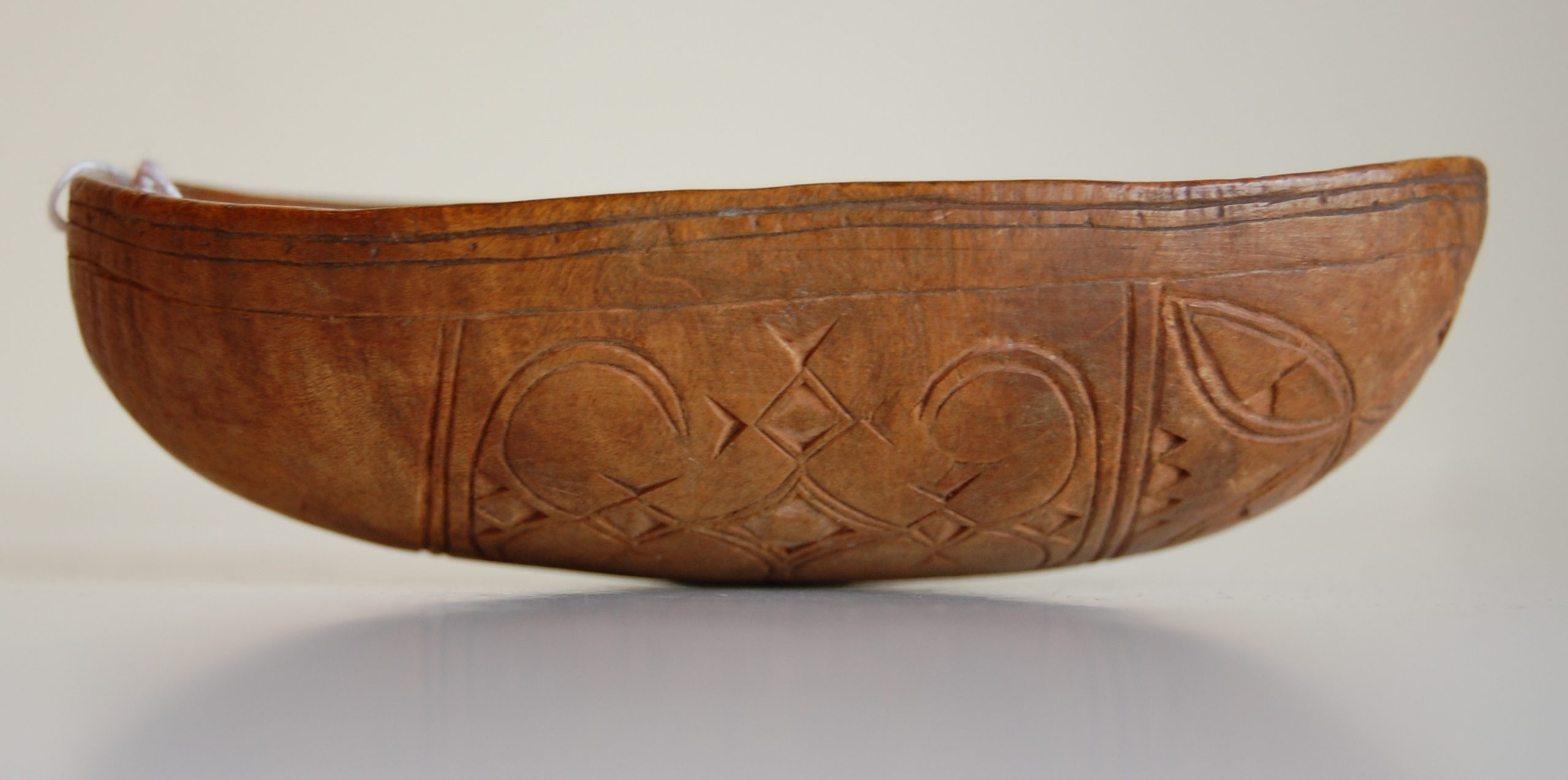 Drinking Cup made of maple or birch burl, date unknown.  The cup was used by a local tribe. Donated by Josephine Brazier in 1943.