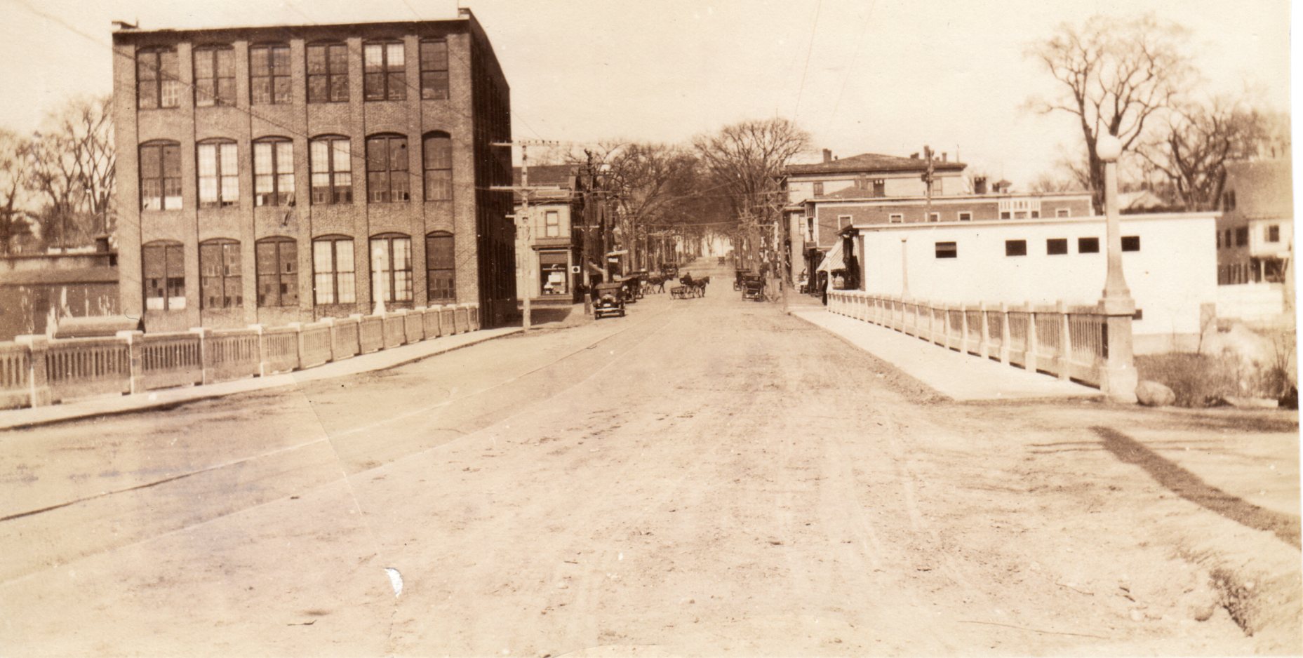 Main Street looking north over the Mousam River bridge, c.1920